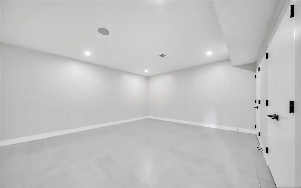 Basement remodeling creating functional living, entertainment, or storage space