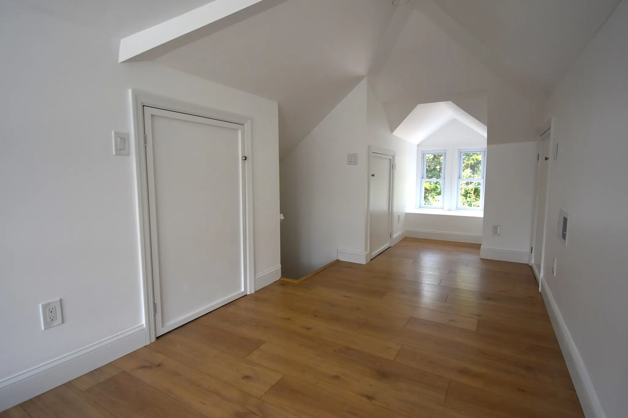 Attic remodeling converting unused space into a comfortable, livable room